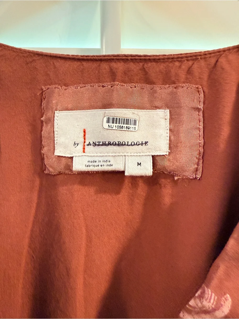 Anthropologie rust brown cropped blouse with white dot print